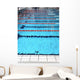 swimming pool with blue water and the swimming lanes Wall Mural