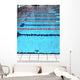 swimming pool with blue water and the swimming lanes Wall Mural