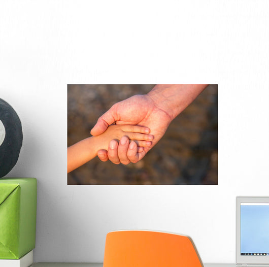Father's hand lead his child son in summer forest nature  Wall Mural