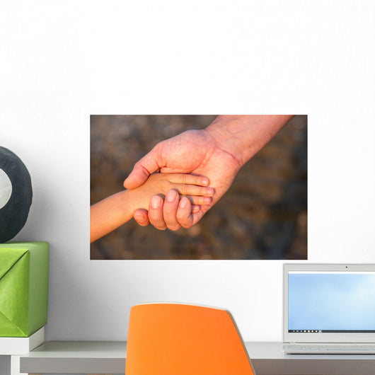 Father's hand lead his child son in summer forest nature  Wall Mural
