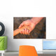 Father's hand lead his child son in summer forest nature  Wall Mural