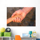 Father's hand lead his child son in summer forest nature  Wall Mural