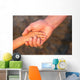 Father's hand lead his child son in summer forest nature  Wall Mural