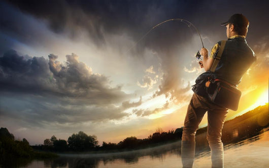 Young Man Fishing At Dramatic Sunset Wall Decal 
