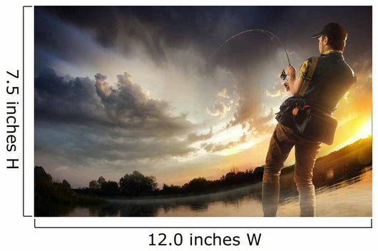 Young man fishing at dramatic sunset Wall Mural