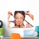 Young woman getting professional beauty and makeup treatment Wall Mural