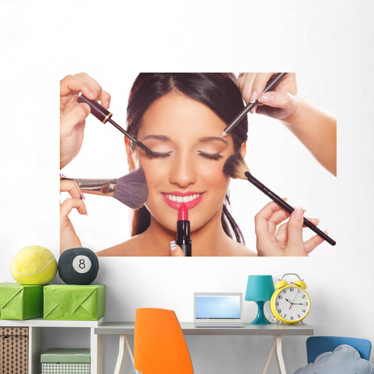 Young woman getting professional beauty and makeup treatment Wall Mural