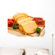 Cheese on cutting board on white background Wall Mural