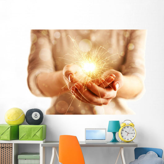 Hands with sparkler light isolated on white Wall Mural