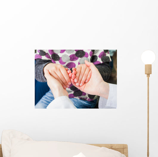Reassuring hands Wall Mural