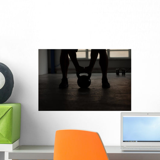 crossfit - kettlebell training backlit Wall Mural