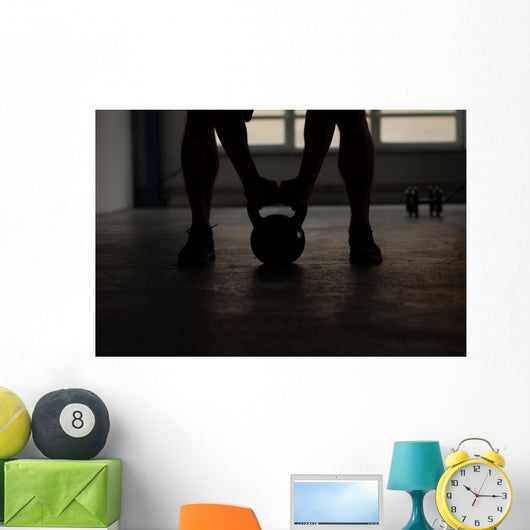 crossfit - kettlebell training backlit Wall Mural