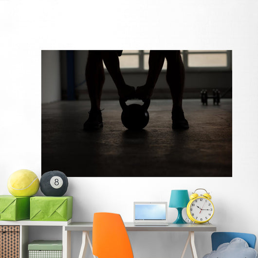 crossfit - kettlebell training backlit Wall Mural