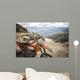 Dirty enduro motorcycle motocross helmet on road Wall Mural