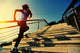 Young Fitness Woman Running On Seaside Stone Stairs Wall Decal