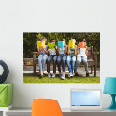 Children Reading Books At Park Wall Decal shown on a wall