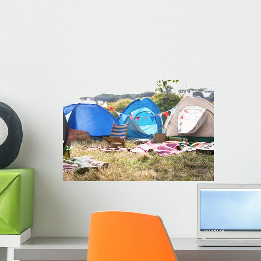 Empty campsite at music festival Wall Mural