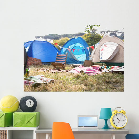 Empty campsite at music festival Wall Mural