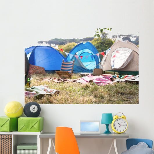 Empty campsite at music festival Wall Mural