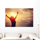 cheering woman open arms at sunrise seaside Wall Mural