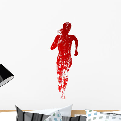 Abstract Red Running Woman Silhouette Wall Decal shown on a wall