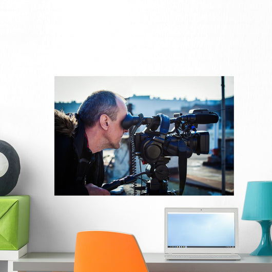 cameraman shooting outdoor Wall Mural
