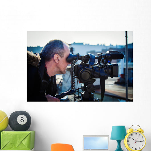 cameraman shooting outdoor Wall Mural