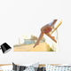 Woman legs silhouette with heels hanging of her hands Wall Mural