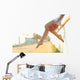 Woman legs silhouette with heels hanging of her hands Wall Mural