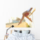 Woman legs silhouette with heels hanging of her hands Wall Mural