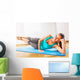 teacher making fitness exercises with passion Wall Mural