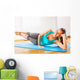 teacher making fitness exercises with passion Wall Mural