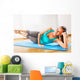 teacher making fitness exercises with passion Wall Mural
