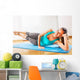teacher making fitness exercises with passion Wall Mural