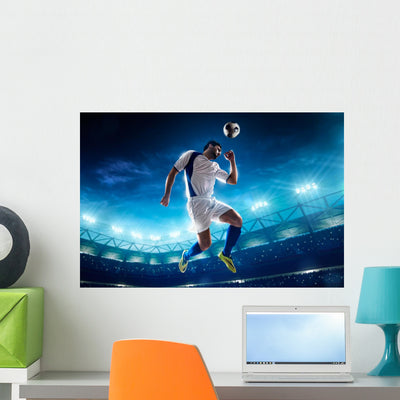Soccer Player In Action Wall Decal 3 shown on a wall