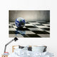world earth on a chessboard isolated on grey wall background Wall Mural