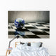 world earth on a chessboard isolated on grey wall background Wall Mural