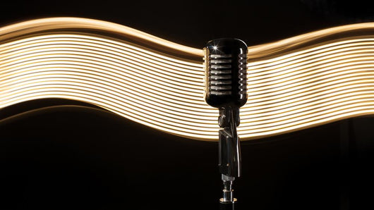 Vintage Retro Microphone On The Black Background With Light Wave Wall Decal