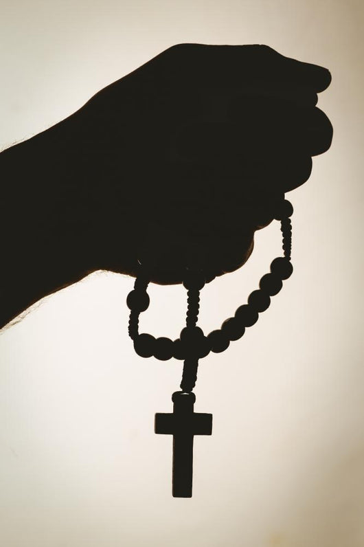 Hand Holding Rosary Beads Wall Decal