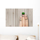 Conceptual finger art. friends are embracing and drinking beer. Wall Mural