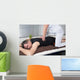 One man and woman performing back shiatsu massage Wall Mural