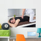 One man and woman performing back shiatsu massage Wall Mural