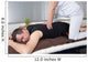 One man and woman performing back shiatsu massage Wall Mural