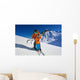Father give mountain ski lesson to little boy Wall Mural