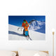 Father give mountain ski lesson to little boy Wall Mural