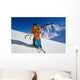Father give mountain ski lesson to little boy Wall Mural