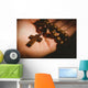 Hand holding wooden rosary beads Wall Mural