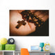 Hand holding wooden rosary beads Wall Mural