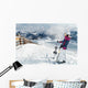 Young female skier admiring the stunning view Wall Mural