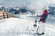 Young Female Skier Admiring The Stunning View Wall Decal